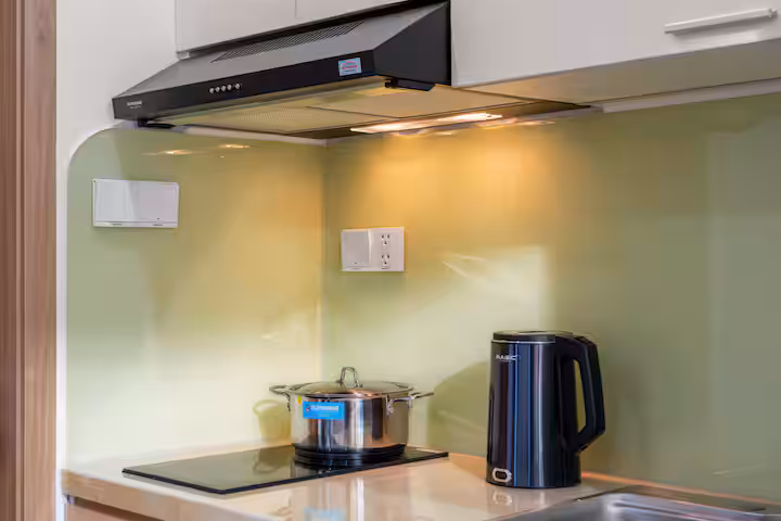 Bleu Marin Studio Apartment Kitchen Da Nang with Stove and Cooking Utensils